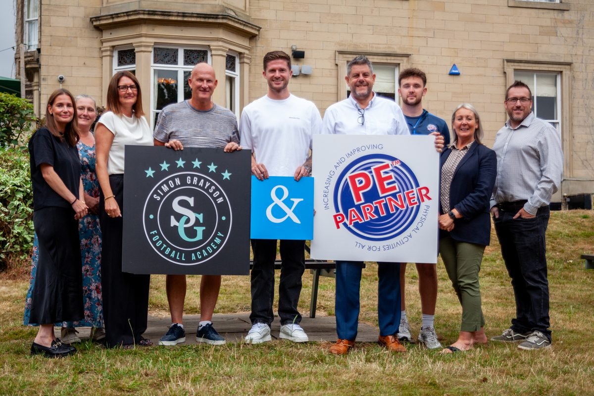 Simon Grayson, Joe Grayson and the PE Partner team at the academy launch