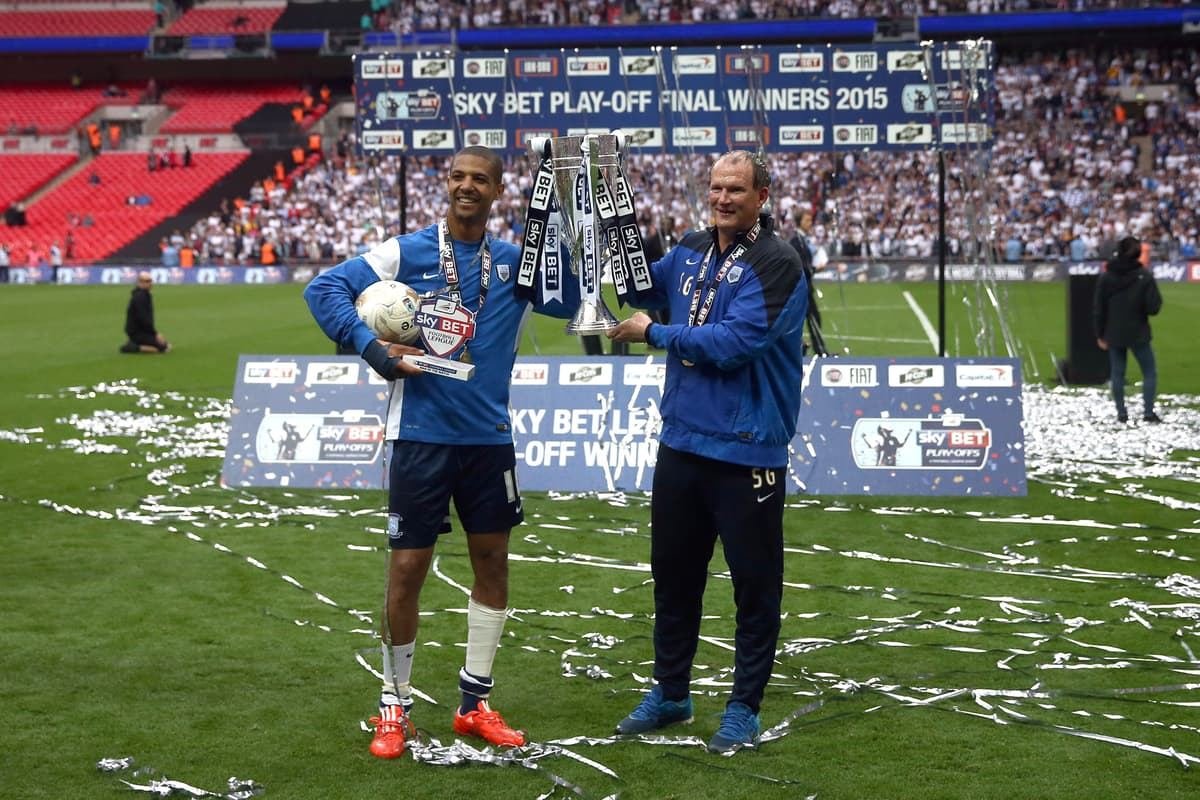 Simon Grayson with the League One play-off trophy at Wembley in 2015